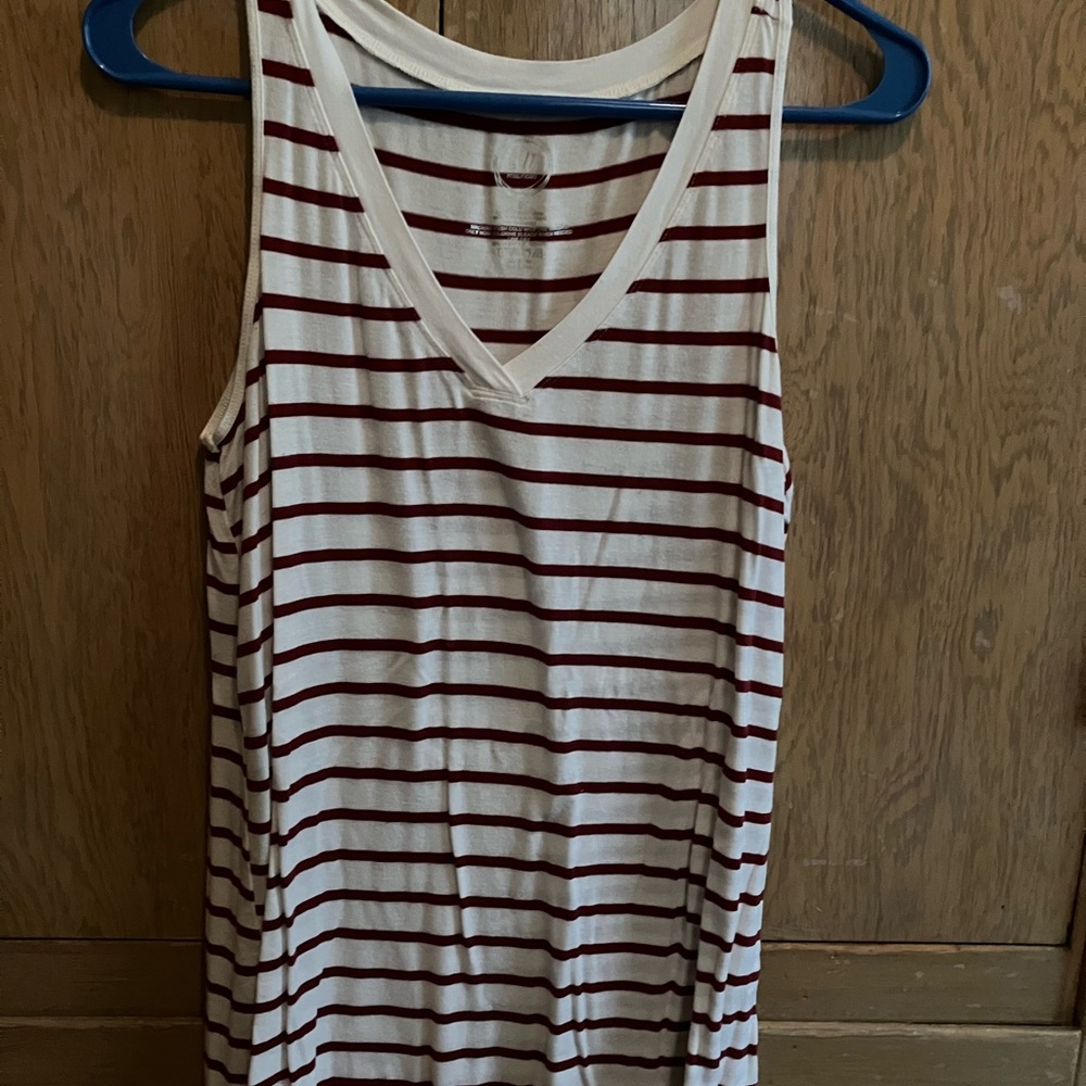 Maurice’s tank top.